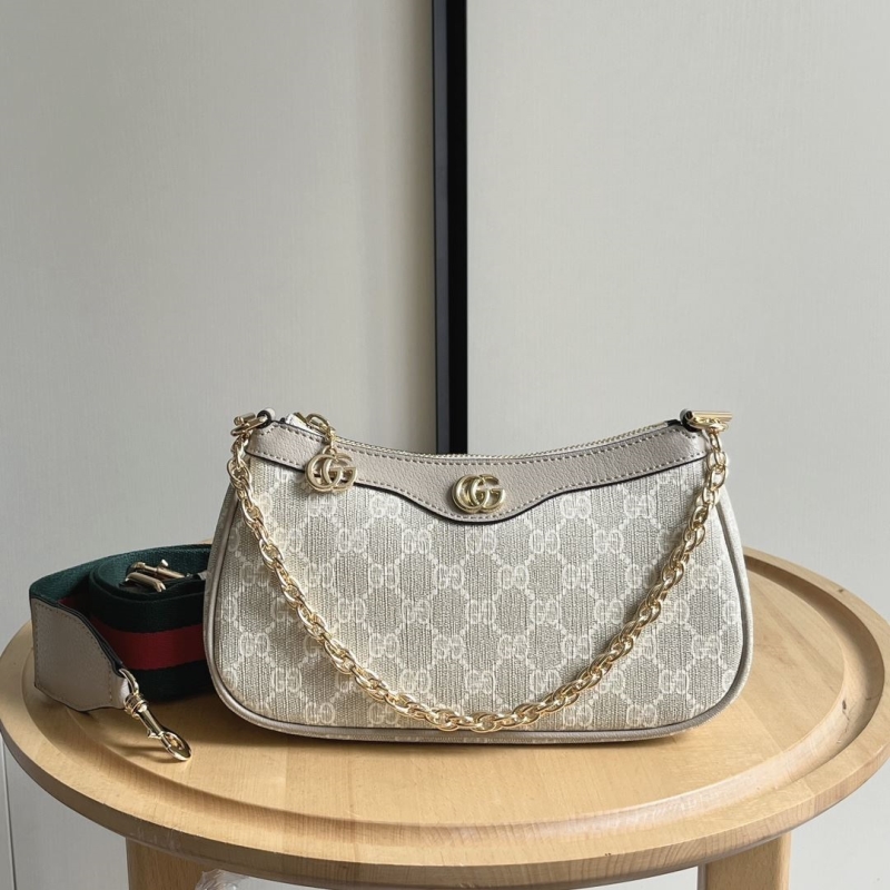 G*u*i top handle bags